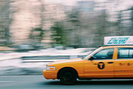 time lapse photography of taxi thumbnail