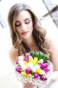 woman holding a bouquet of flower thumbnail