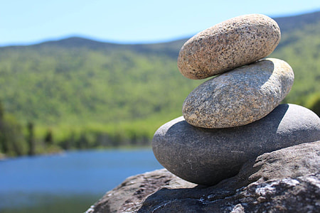 three stones near body of water thumbnail