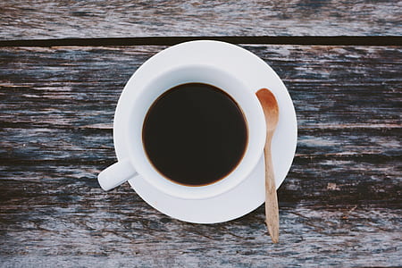 cup of coffee on saucer with spoon thumbnail