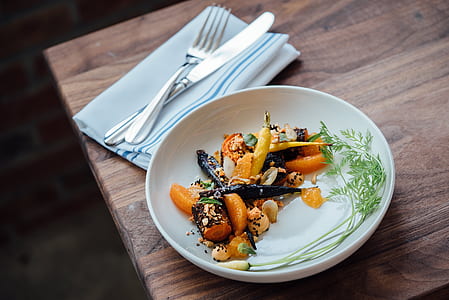 cooked food on round white ceramic plate thumbnail