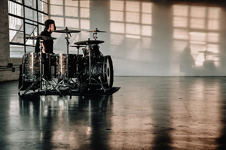 man's playing drum instrument thumbnail