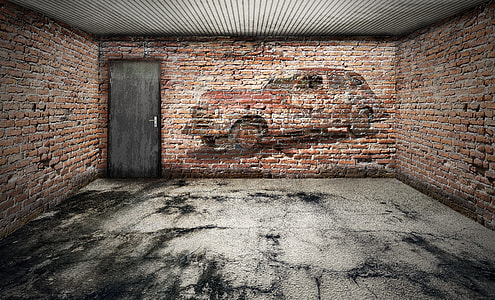car illustration on brick wall with black wooden door inside room thumbnail