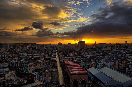 selective focus photography of buildings during golden hour thumbnail