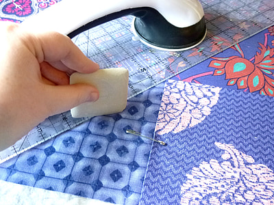 person holding white pad thumbnail