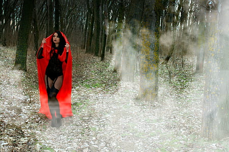 woman wearing red robe on forest thumbnail