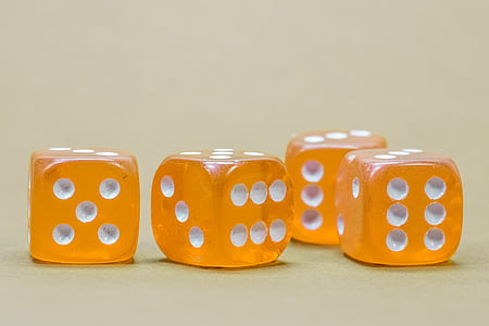 four orange-and-white dices thumbnail