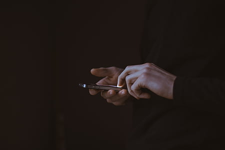 person using mobile phone thumbnail