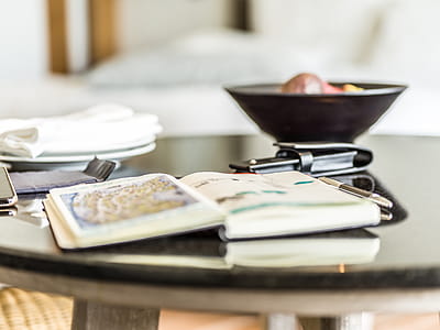 Close-Up Photography of Pen And Book On Desk thumbnail