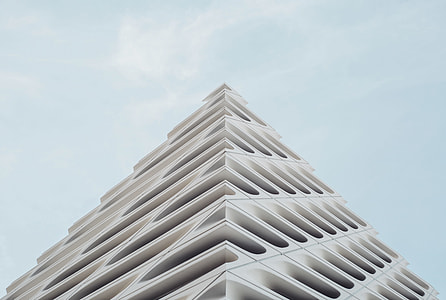 white concrete building in low angle photography thumbnail