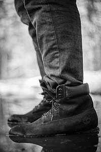 grayscale photo of man wearing Timberland nubuck work boots thumbnail