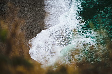 aerial photography of sea waves thumbnail