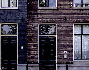 black wooden door thumbnail