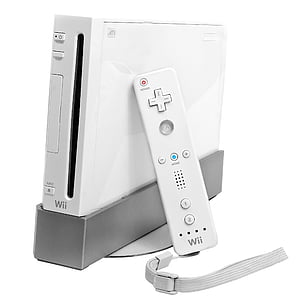 white Nintendo Wii with controller thumbnail