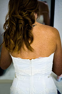 back view of woman in white lace dress thumbnail