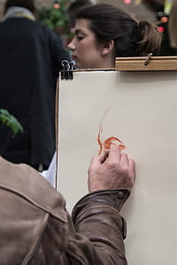 Person Sketching Woman's Face thumbnail