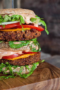 burger sandwich with lettuce, tomato, beef, and cheese thumbnail