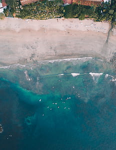 aerial view on body of water beside houses thumbnail
