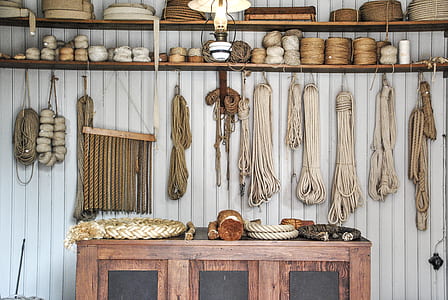 white ropes hanging on wall thumbnail