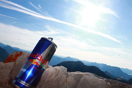 Red Bull energy drink can on concrete slab during daytime thumbnail