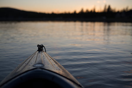 closeup photography of yellow kayak thumbnail