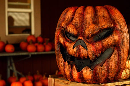 shallow focus photography of brown and black jack-o-lantern thumbnail