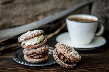 three macaroons and one ceramic mug thumbnail