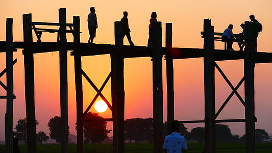 silhouette of people on bridge thumbnail