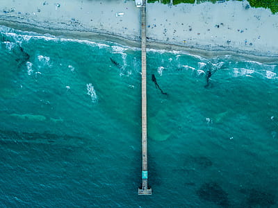 aerial photography of beach deck thumbnail