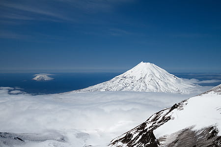 mountain with snow during daytime thumbnail