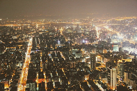 aerial photo of lighted high-rise buildings thumbnail