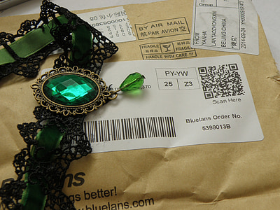 green strap with gemstone on brown paper thumbnail