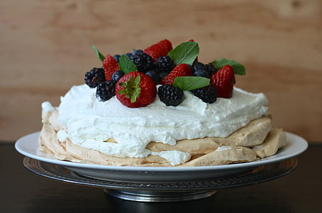 waffle with whipped cream and strawberry toppings served on white plate thumbnail