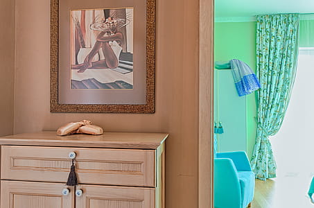 Brown Wooden Cabinet Near Doorway thumbnail