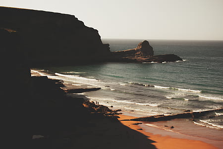 aerial photography of ocean waves on seashore at daytime thumbnail