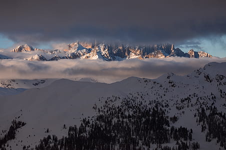 aerial photography of mountain covered snow at daytime thumbnail