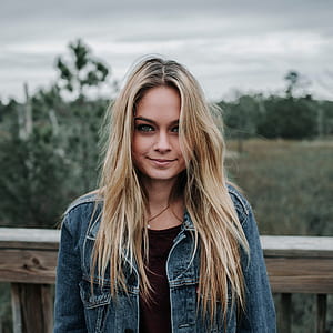 woman in blue denim jacket thumbnail