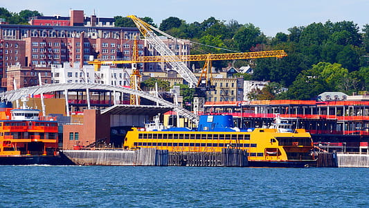 State Island ferry makes the 5 mile crossing between Lower Manhattan and St. George Terminal on Staten Island in about 25 minutes. The crossing provides one of the best views of Lower Manhattan, Statue of Liberty and Ellis Island ... and it s all free. thumbnail