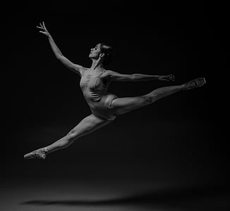 ballerina dancing on dark room thumbnail