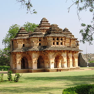 brown temple with trees on the side thumbnail