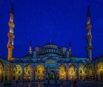 yellow and white mosque under blue sky painting thumbnail