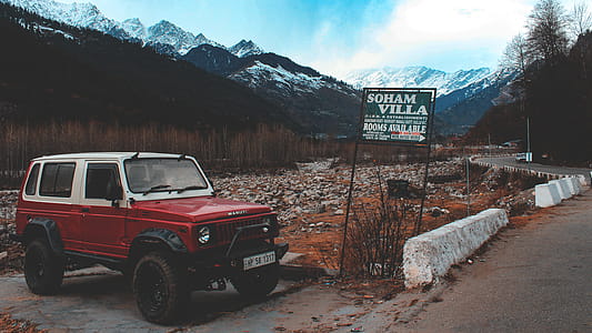 Red and White Suv thumbnail