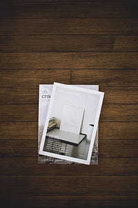 thisispaper on brown wooden surface thumbnail