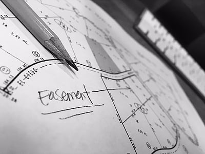 grayscale photo of site plan paper and pencil thumbnail