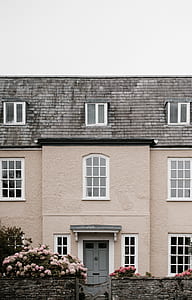 gray and white concrete house thumbnail