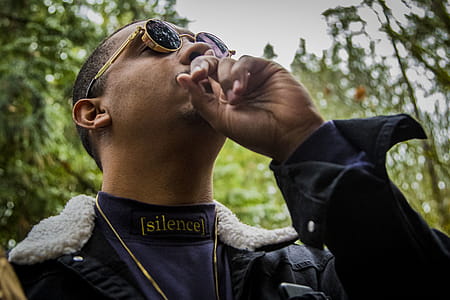 Photography of a Man Wearing Steampunk Sunglasses thumbnail