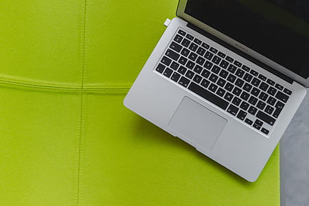 View from above at the laptop on the lime chair thumbnail