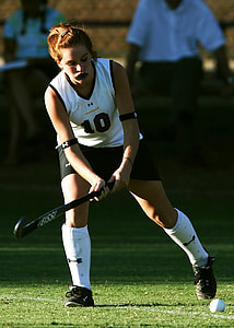 woman playing field hockey thumbnail