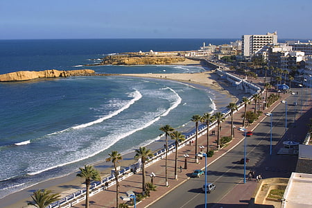 aerial photo of beach near road thumbnail
