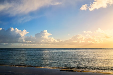 calm sea under blue sky thumbnail